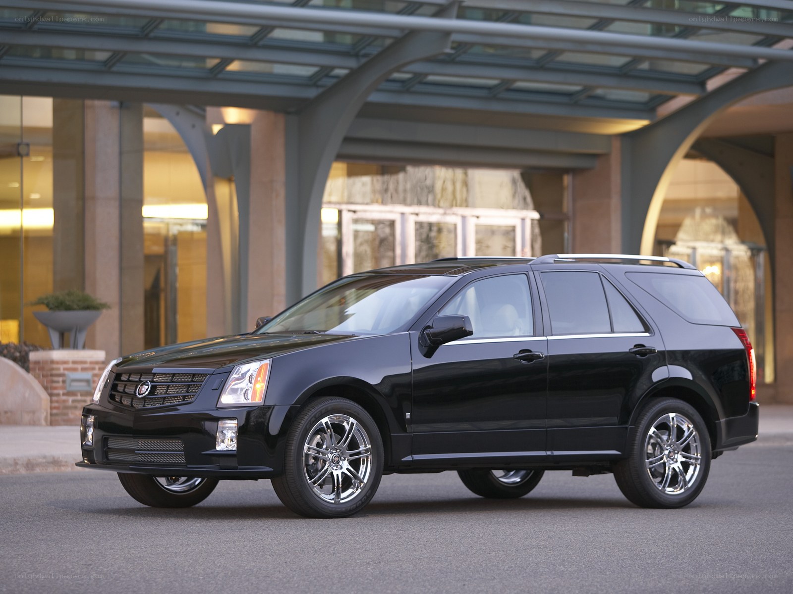 Black Cadillac SRX parked outside