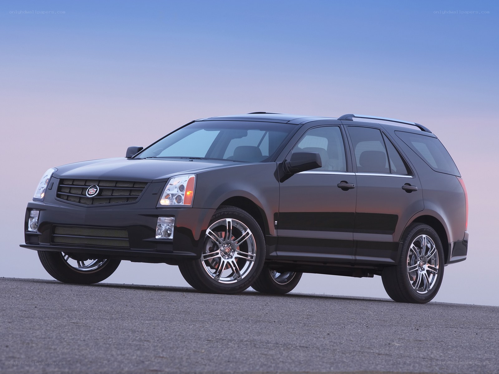 black cadillac suv