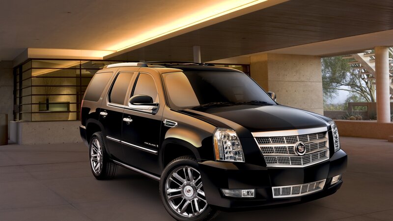 Black Cadillac Suv — Dramatic, Afternoon, Photograph, Building