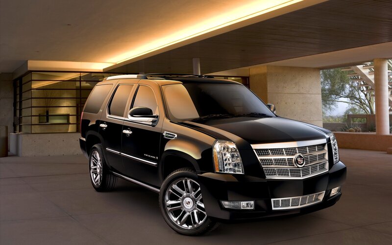 Black Cadillac Suv — Dramatic, Afternoon, Photograph, Building, Windows