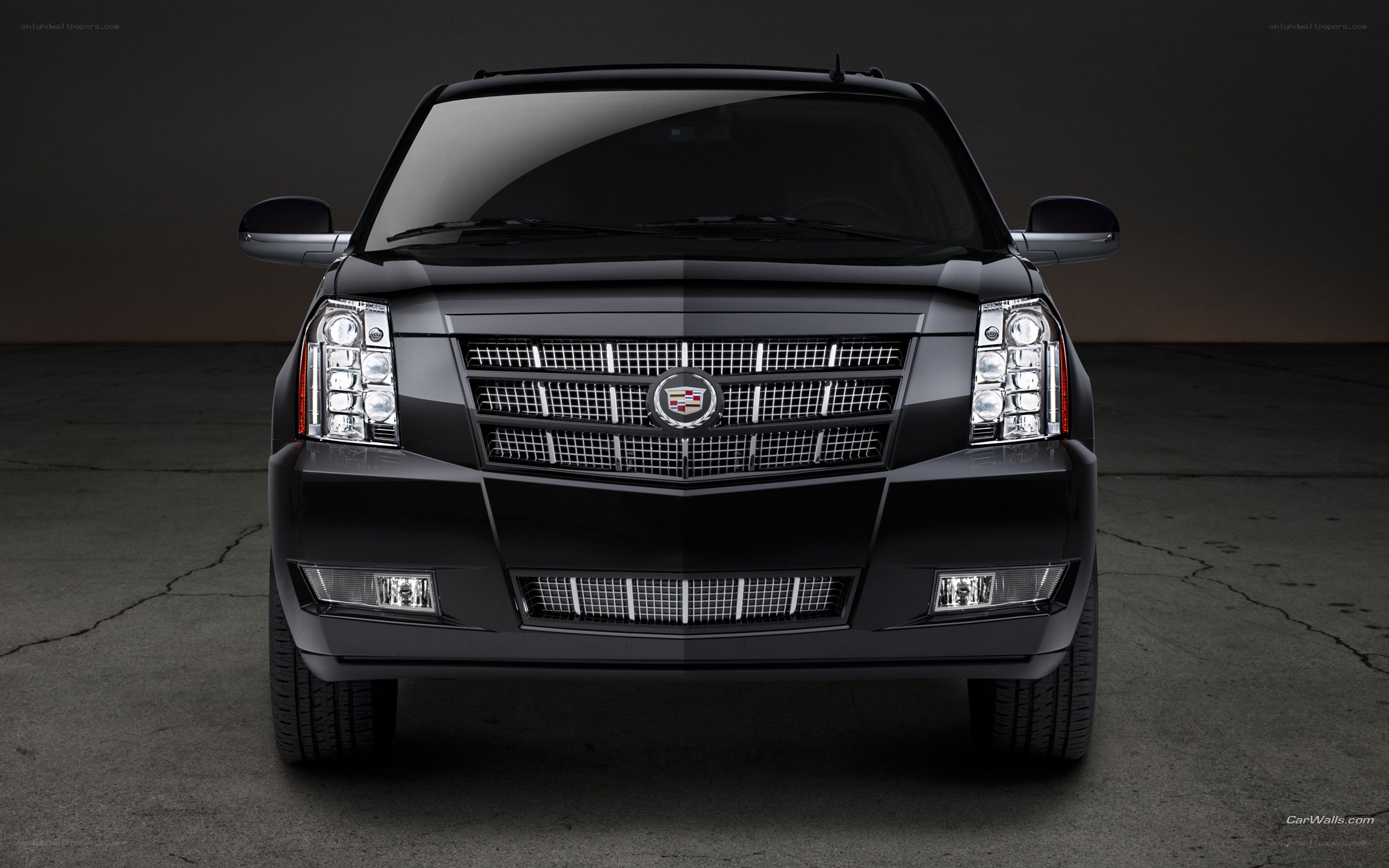 black cadillac suv front view