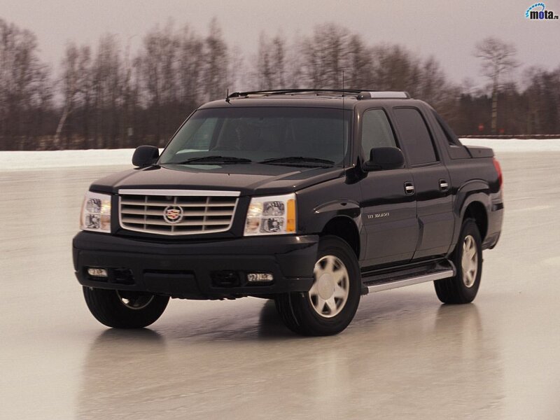 black cadillac truck on ice