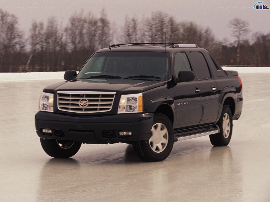 black cadillac truck on ice