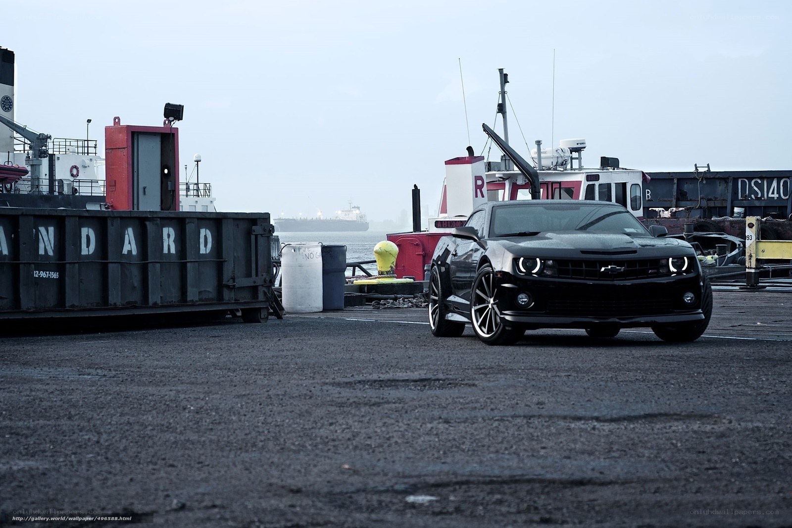 Black Camaro at a port