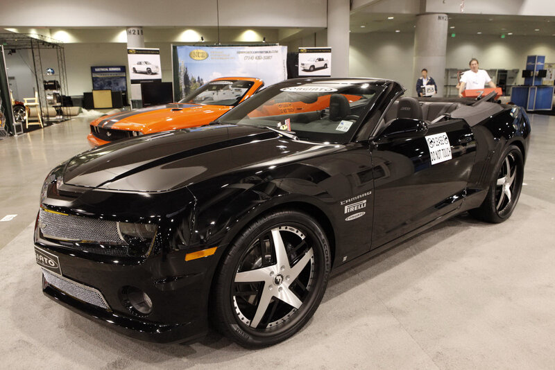 Black Camaro convertible at auto show