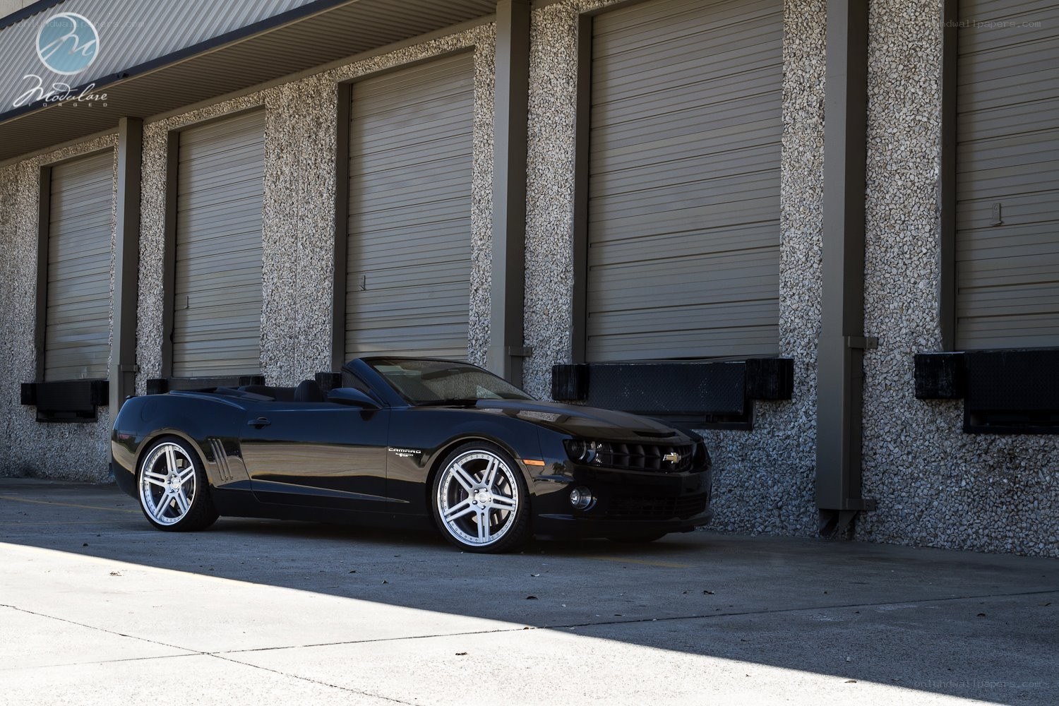 Black Camaro convertible parked