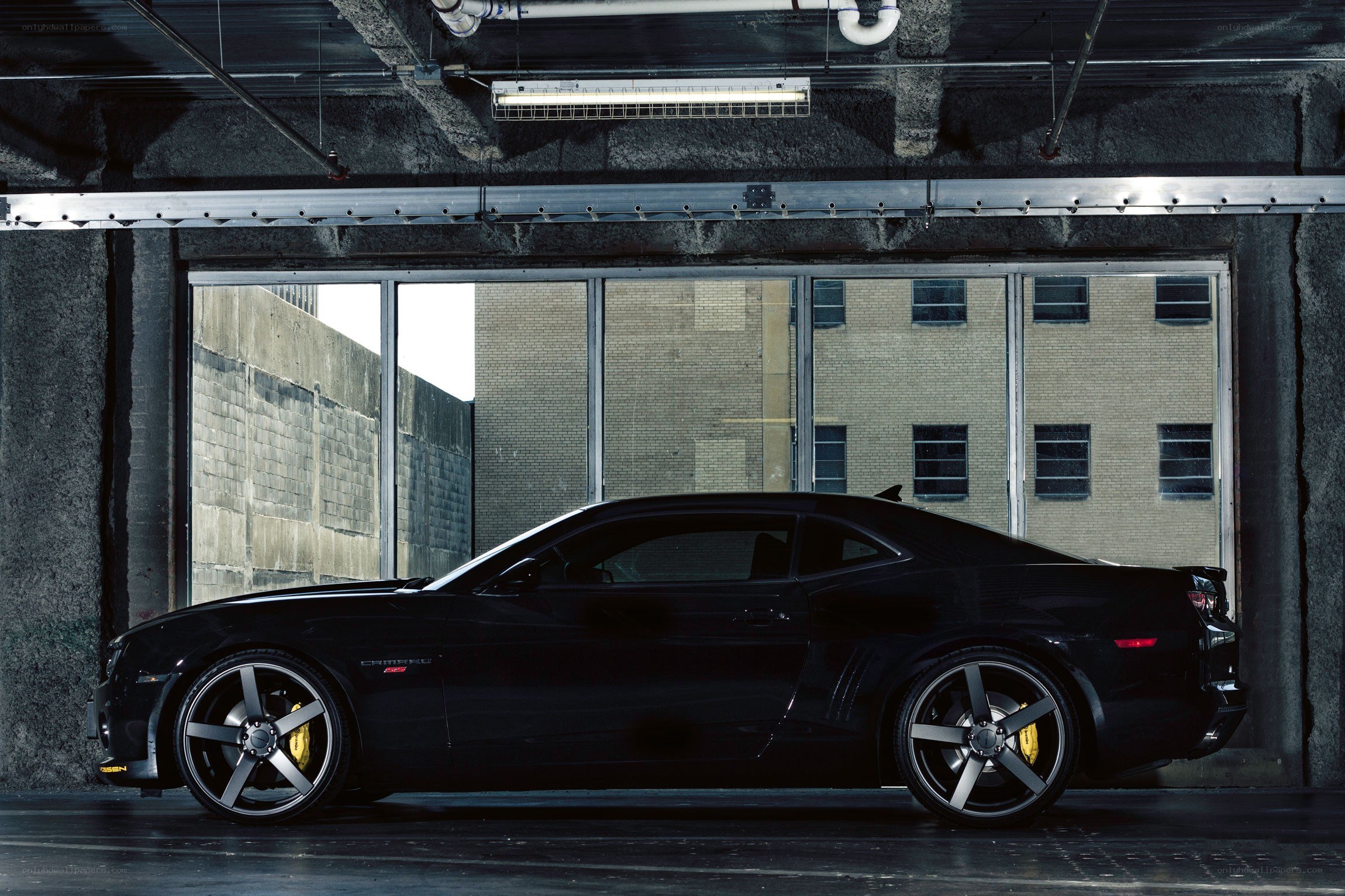 Black Camaro in garage