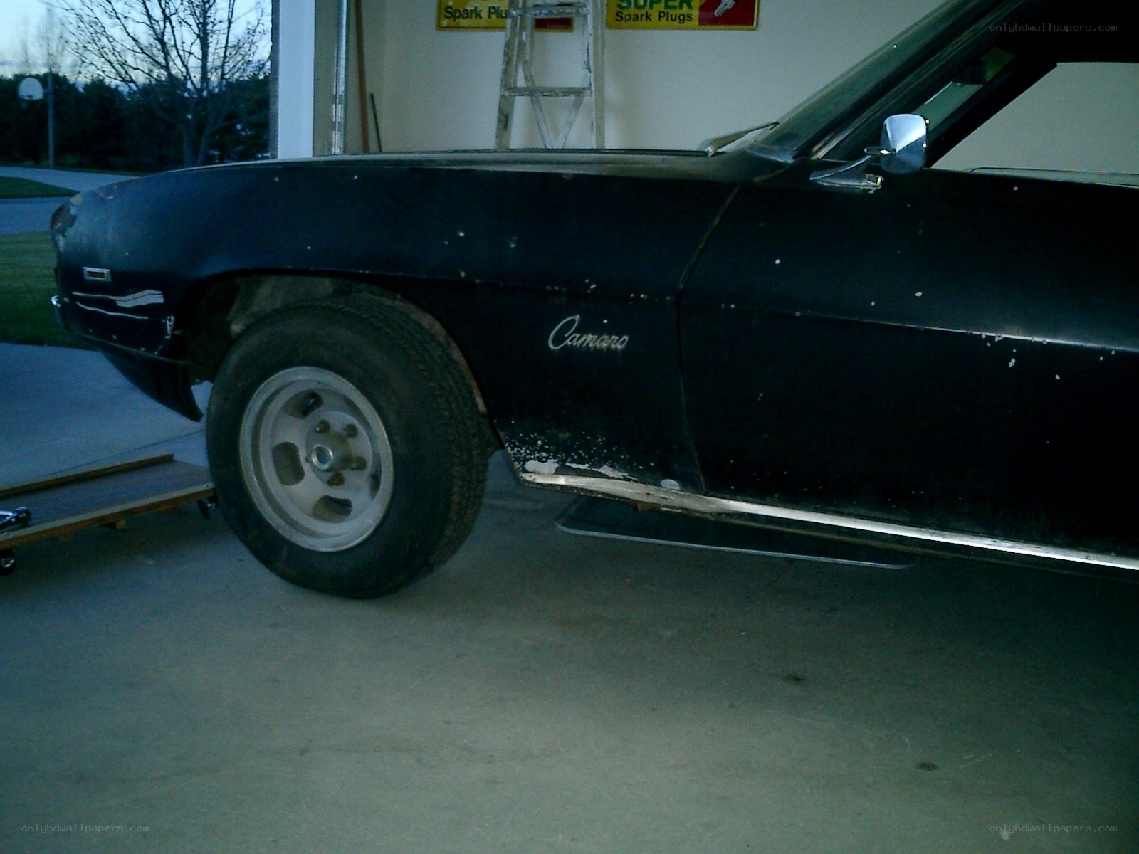 black camaro in garage