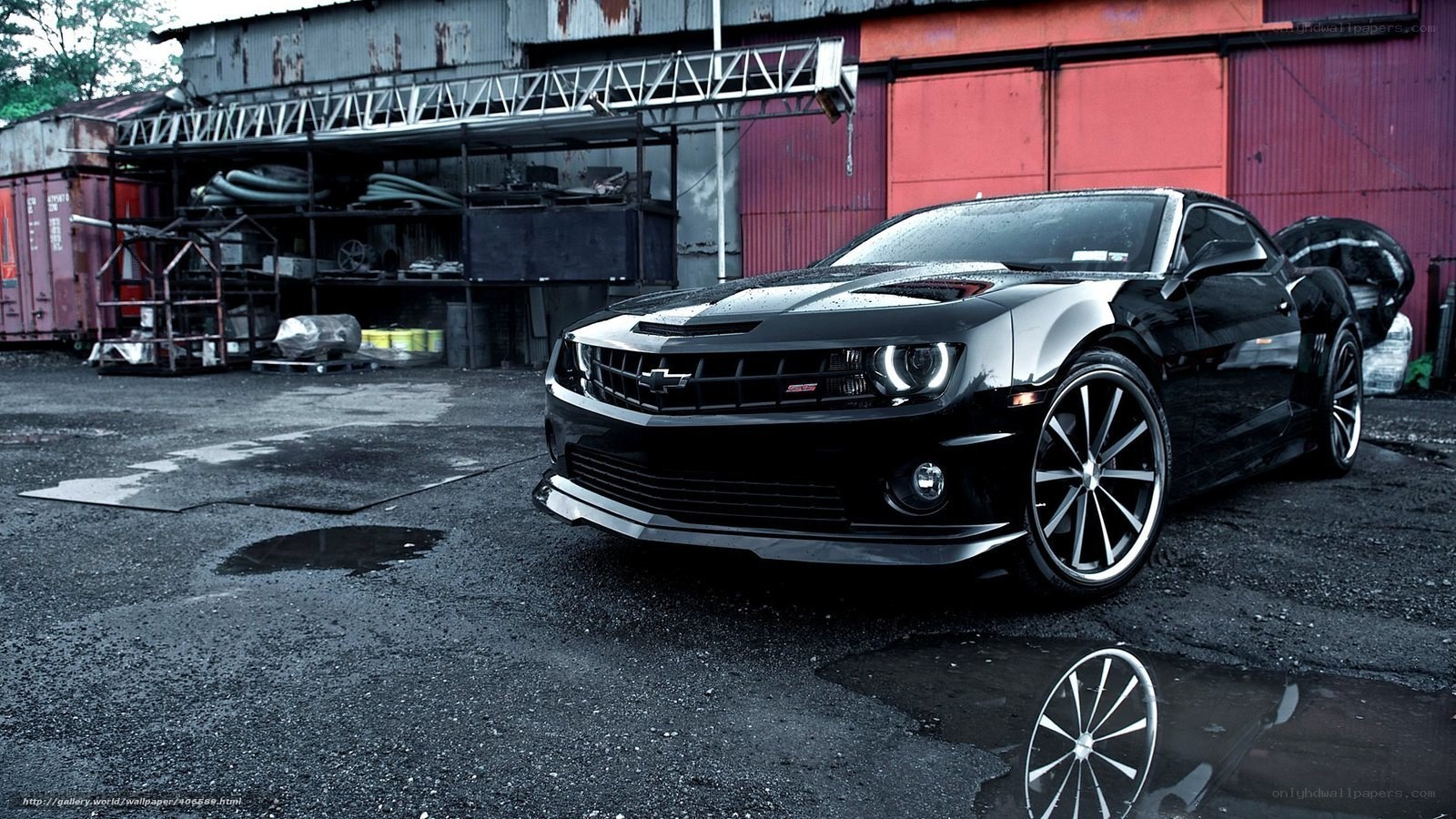 black camaro in industrial lot