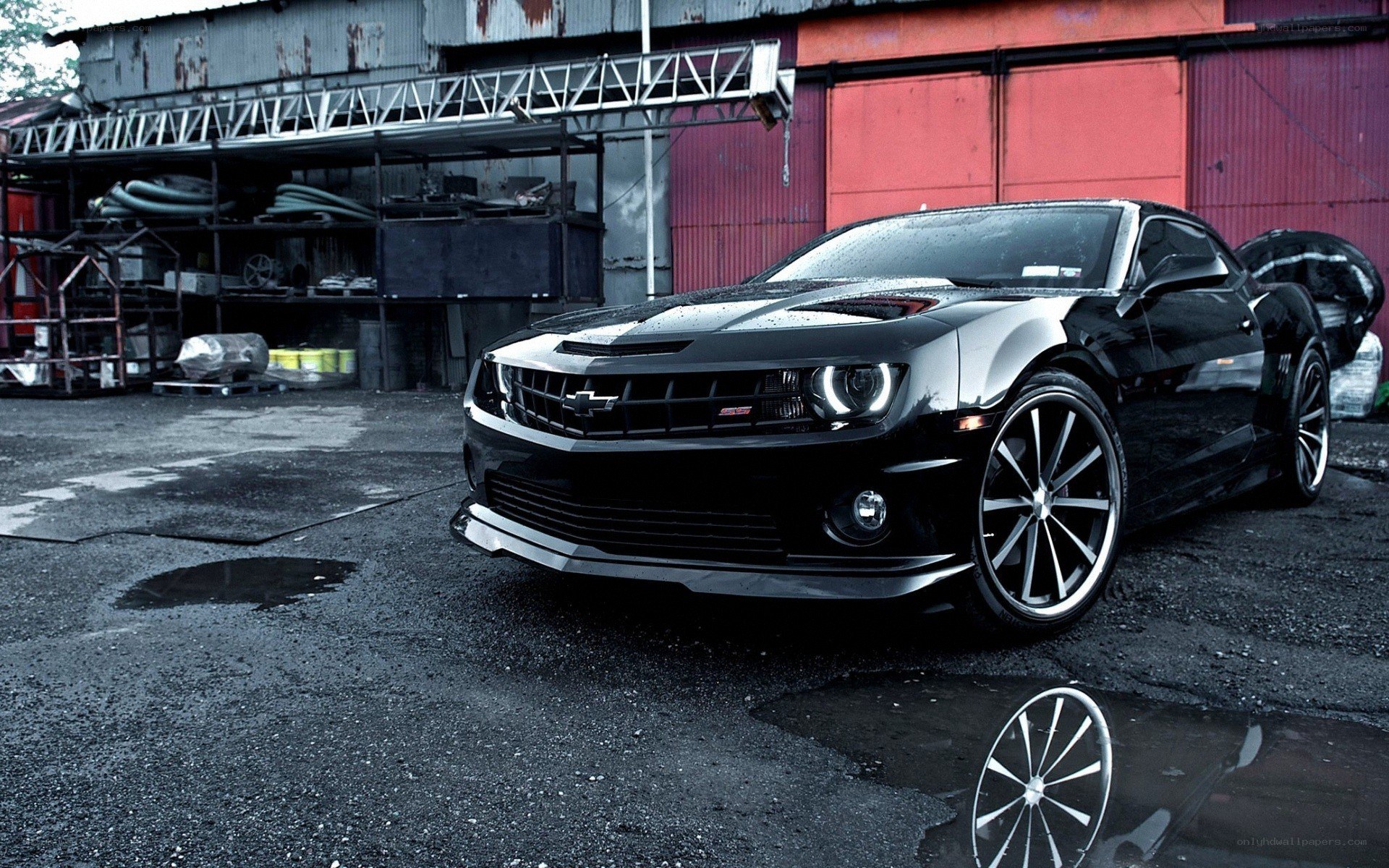Black Camaro in industrial setting