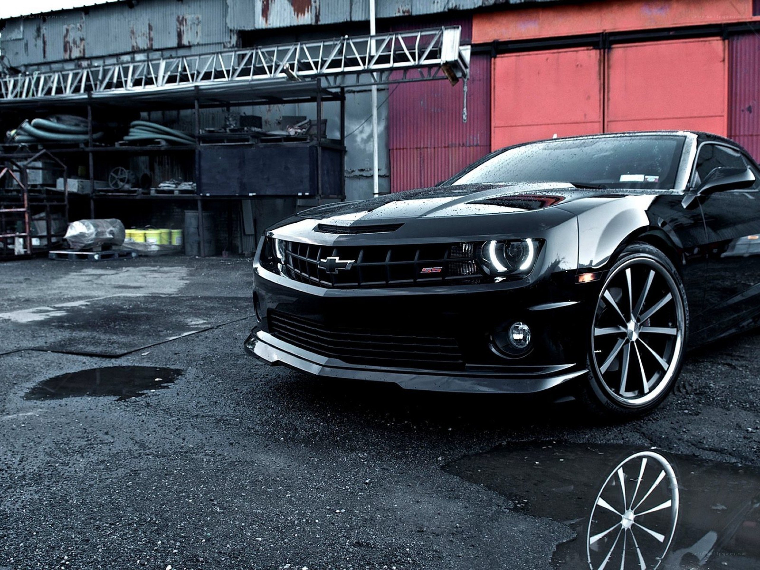 Black Camaro in industrial setting