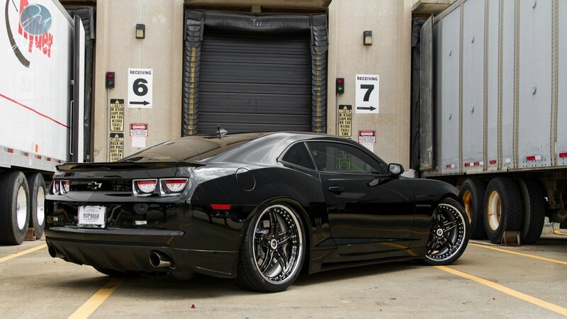 Black Camaro in loading dock