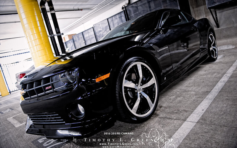 Black Camaro in parking garage
