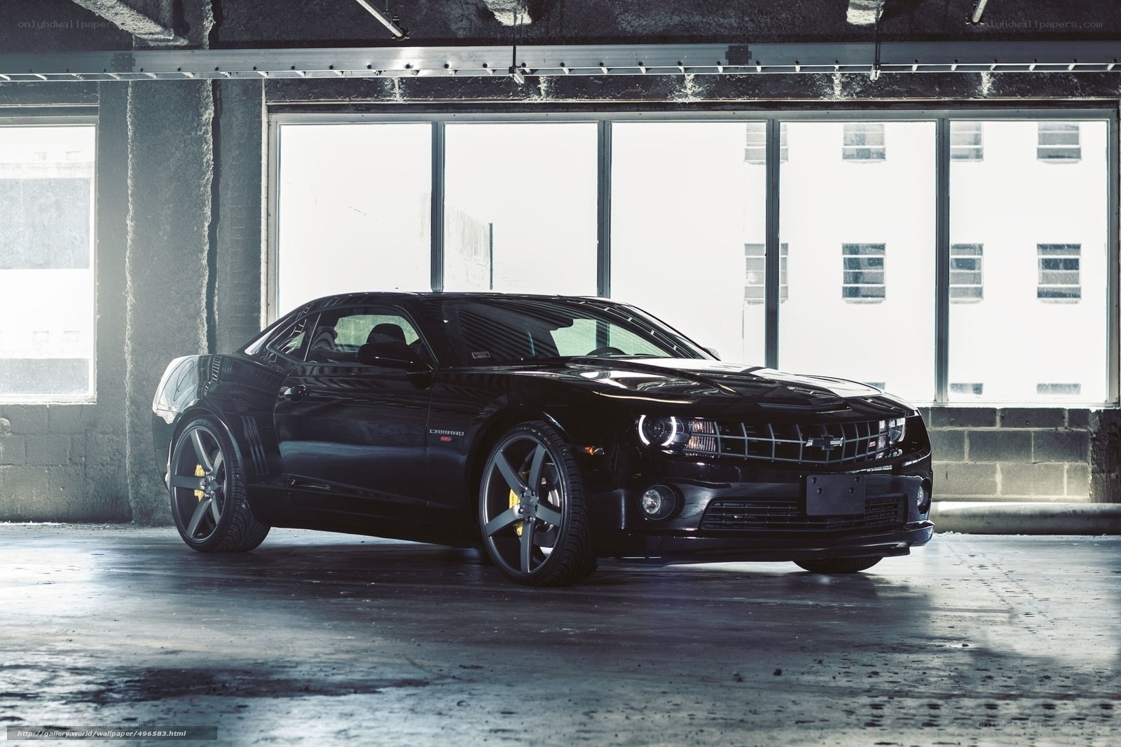 Black Camaro in parking garage