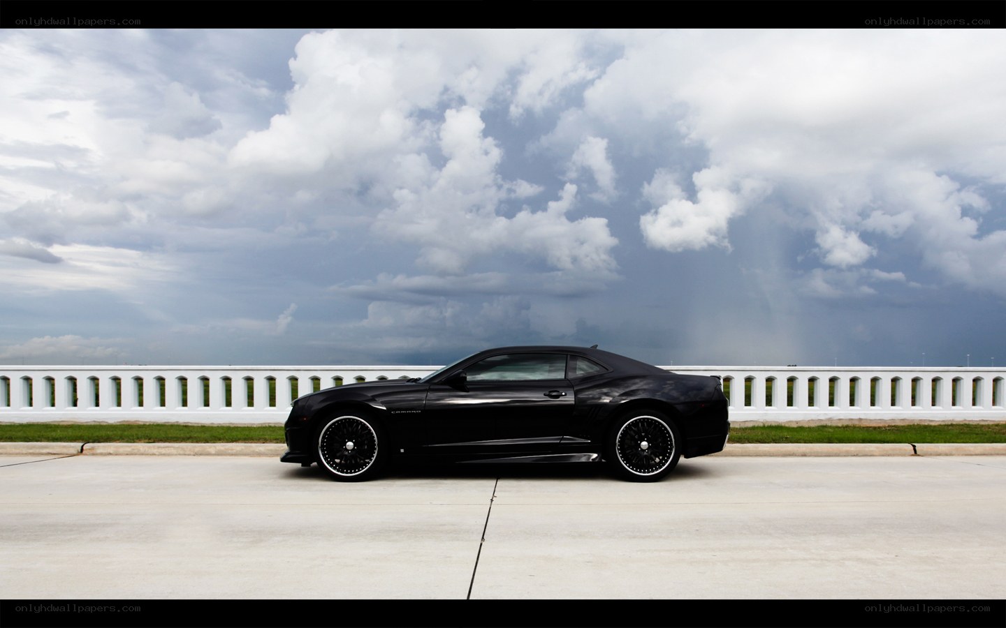 Black Camaro on a cloudy day