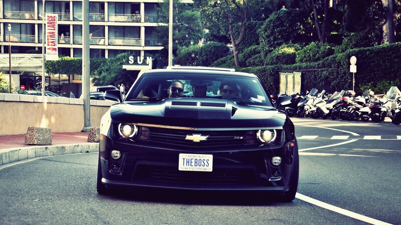 Black Camaro on city street
