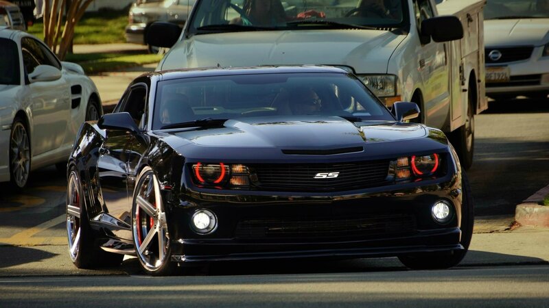 Black Camaro SS on city street