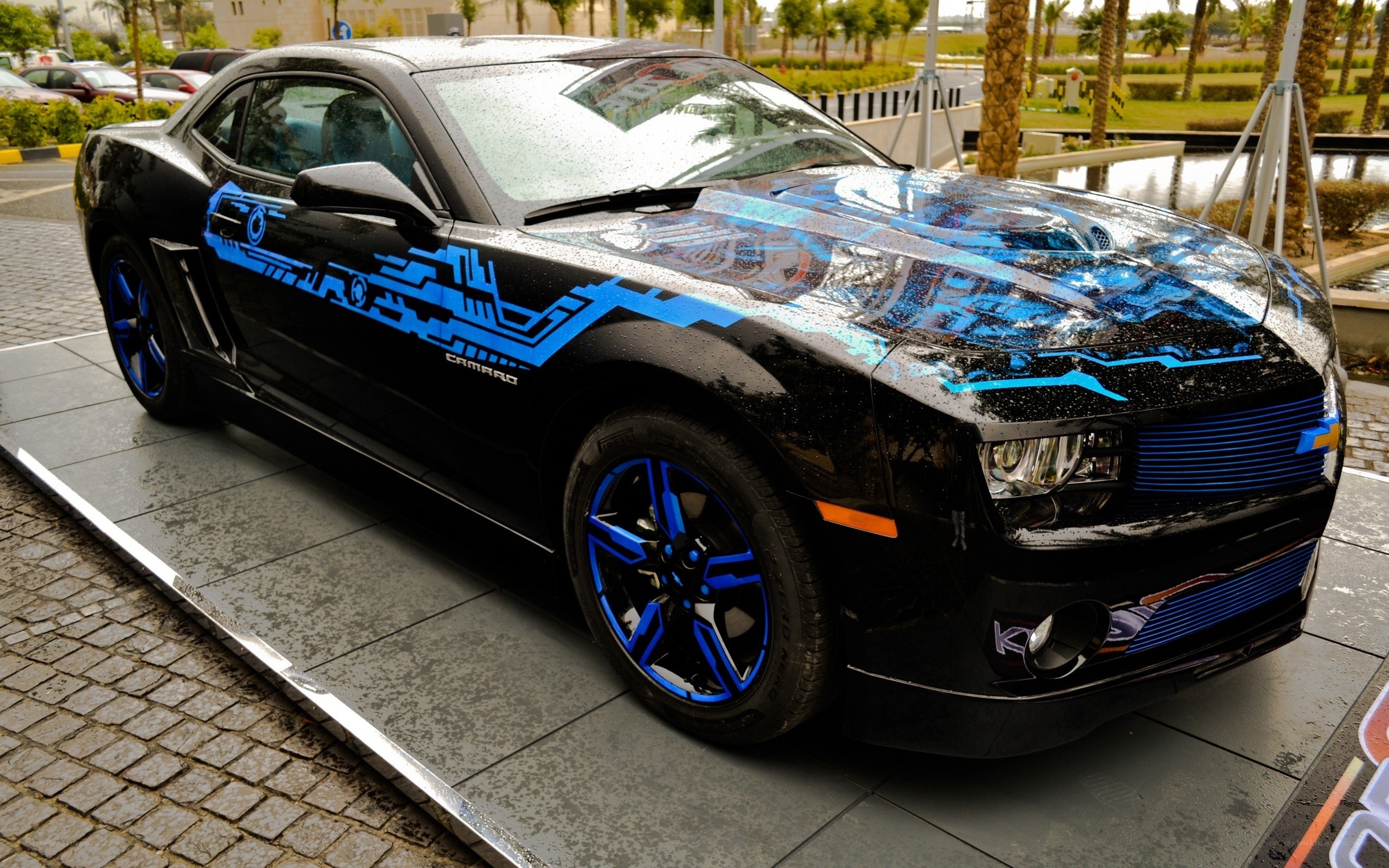 black camaro with blue graphics
