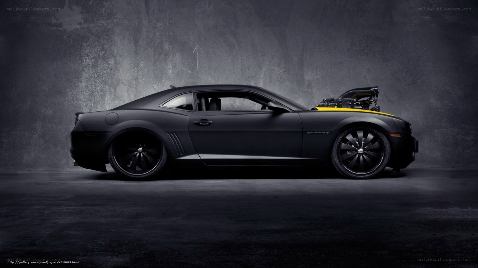 black camaro with exposed engine