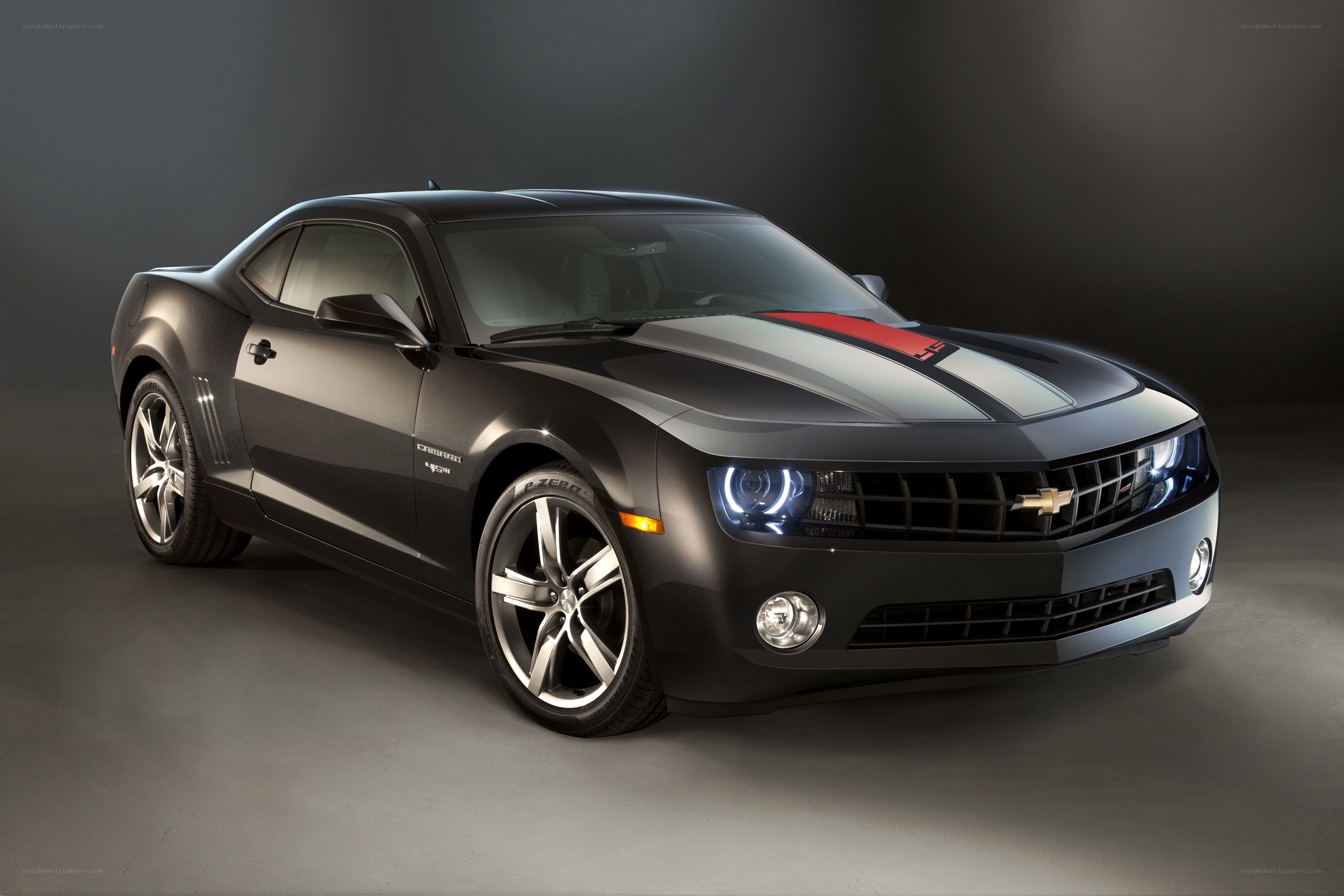 Black Camaro with racing stripes