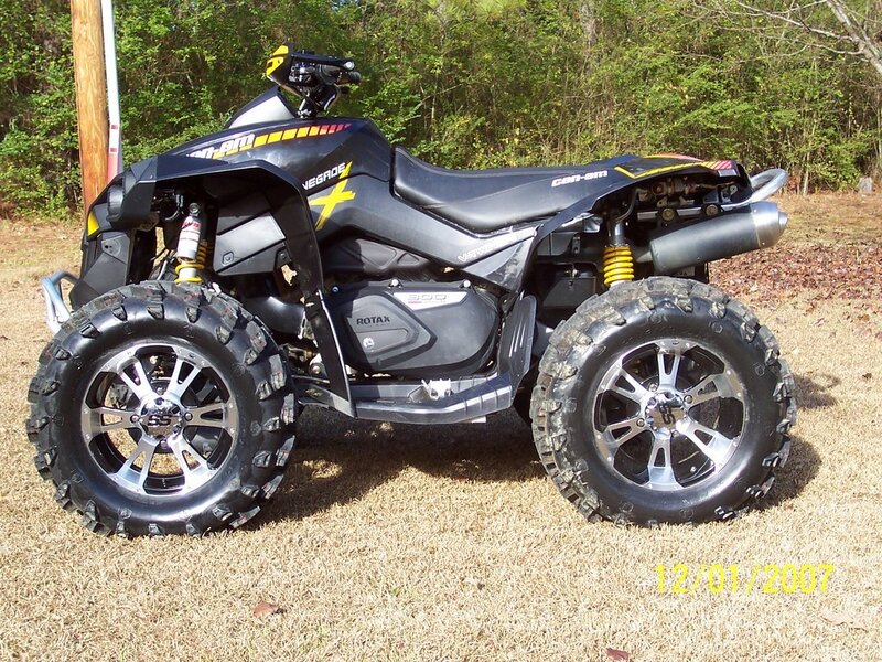 black can-am atv on grass