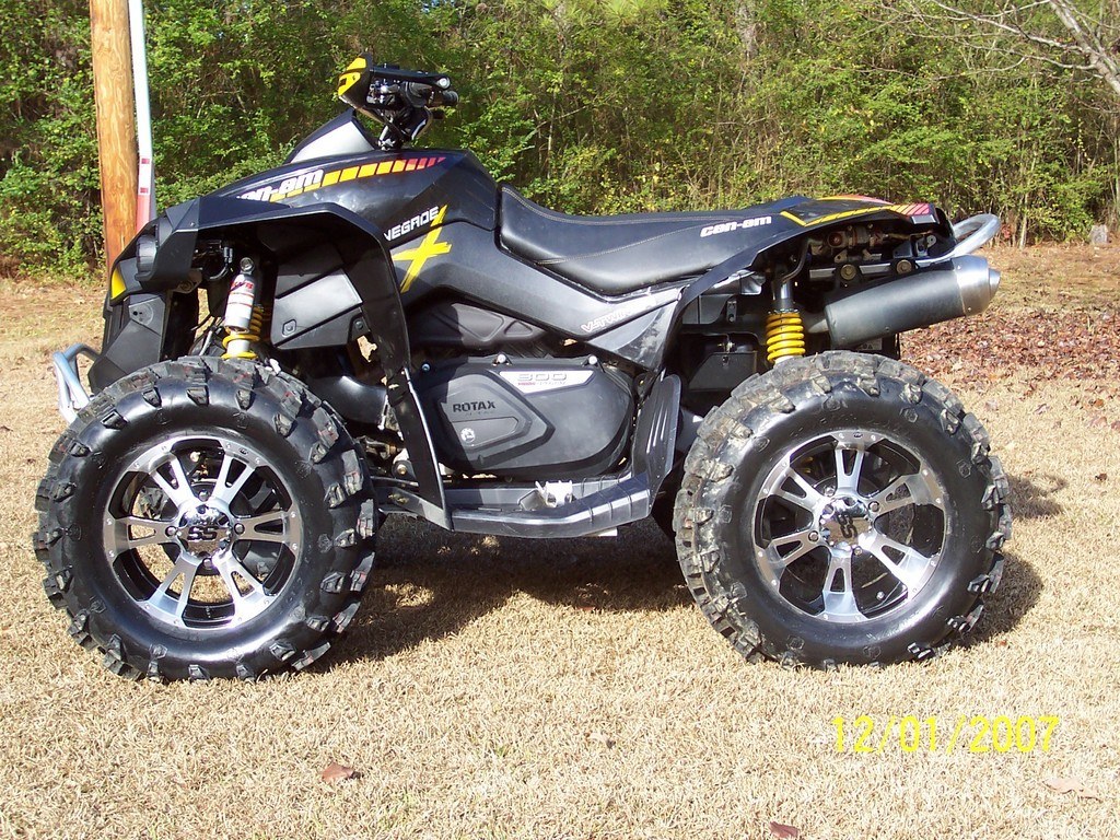 black can-am atv on grass