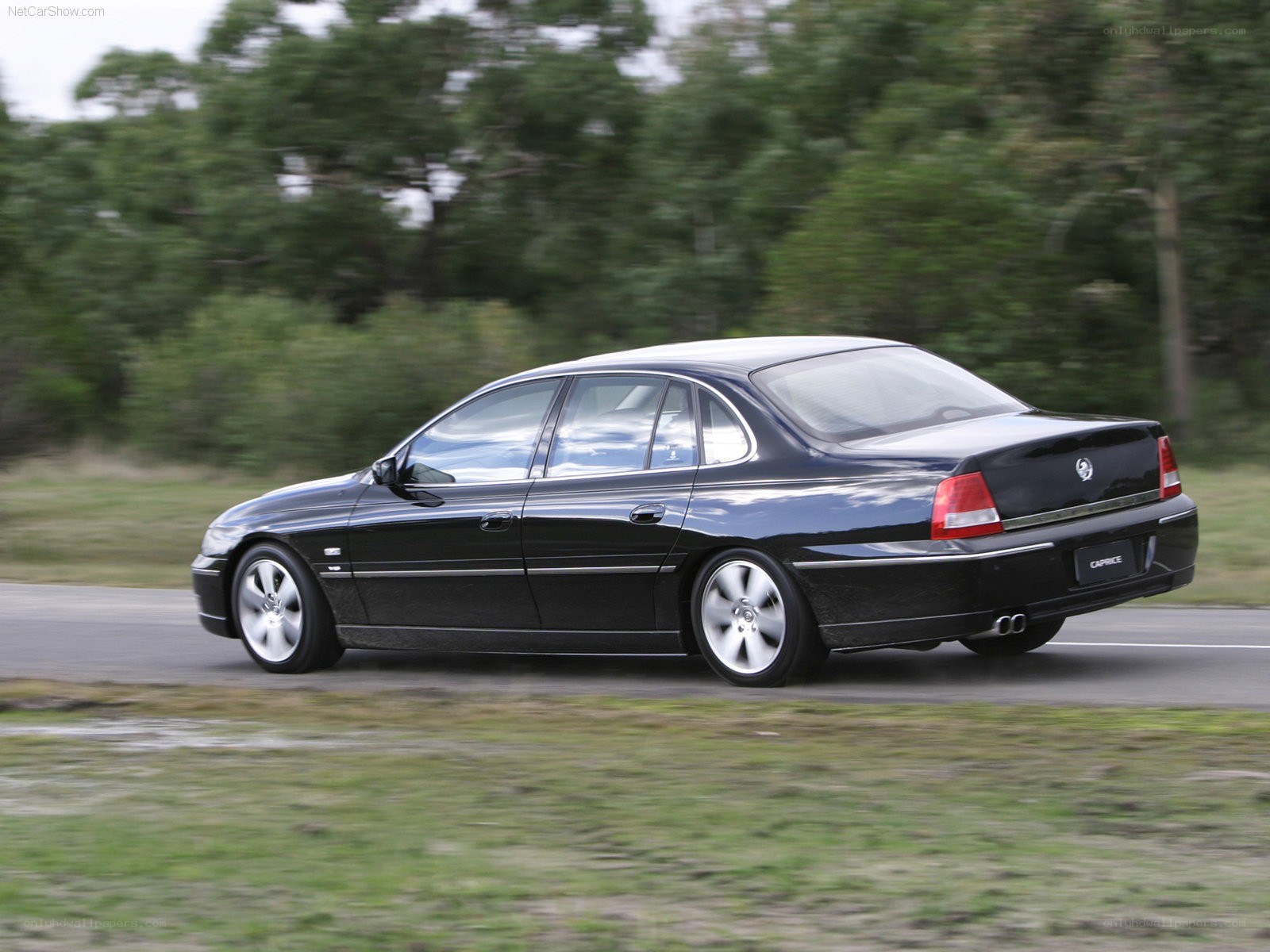 black caprice sedan in motion
