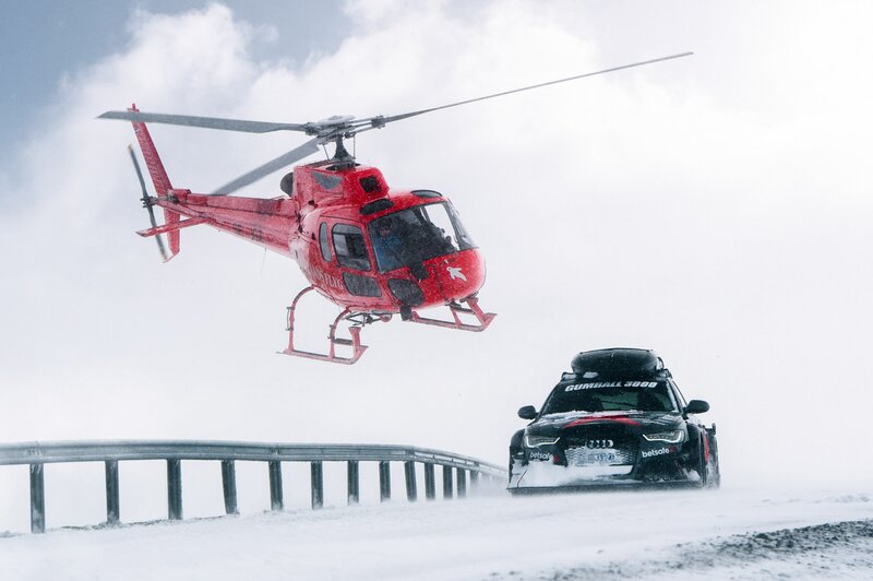 Black Car and Red Helicopter