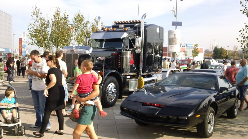 Black Car and Truck at Event