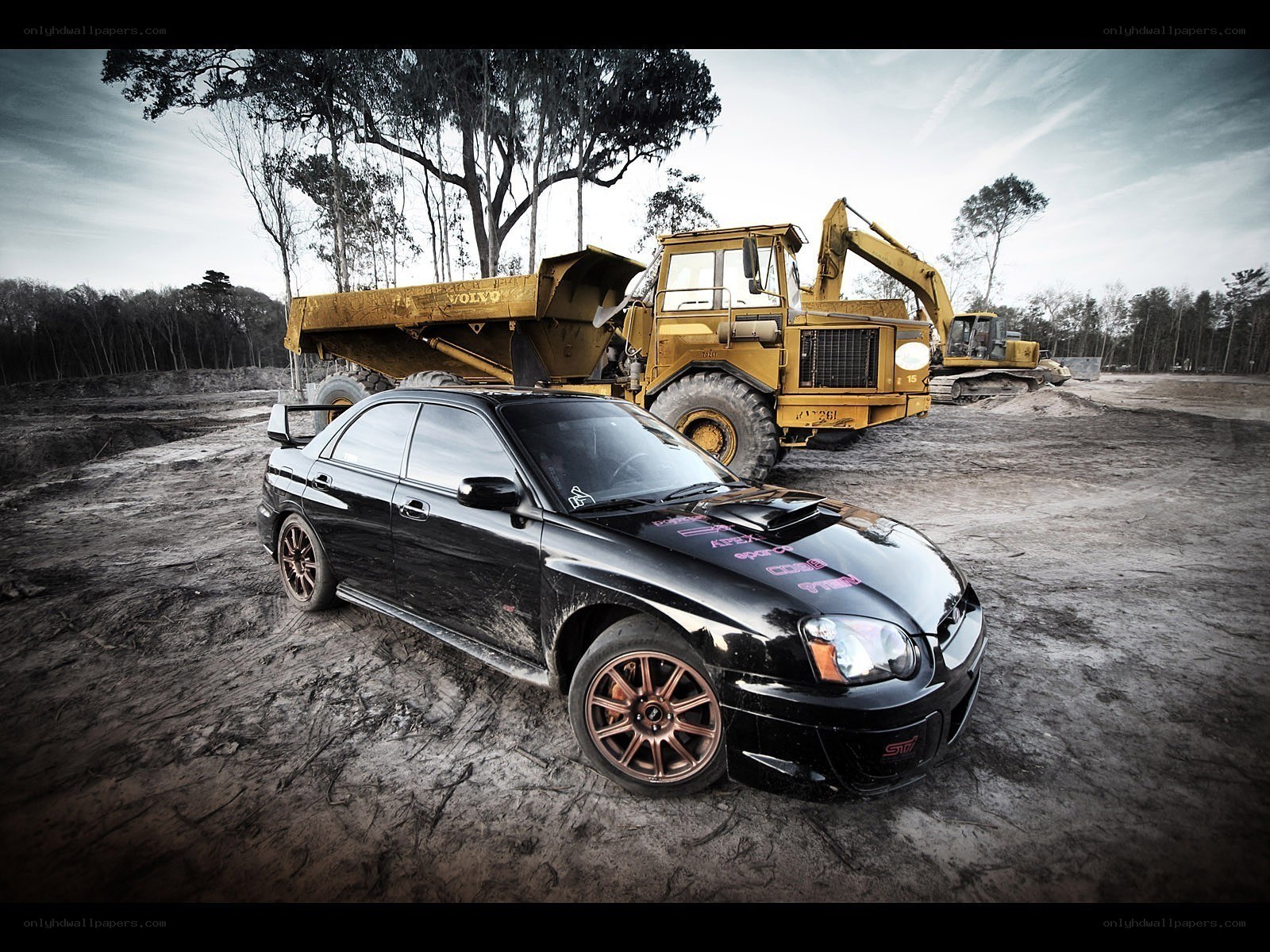 Black car at construction site
