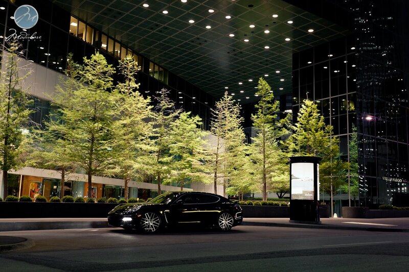 Black car at night in city