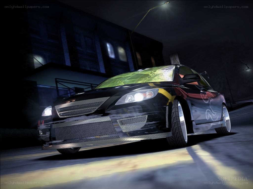 black car at night on street