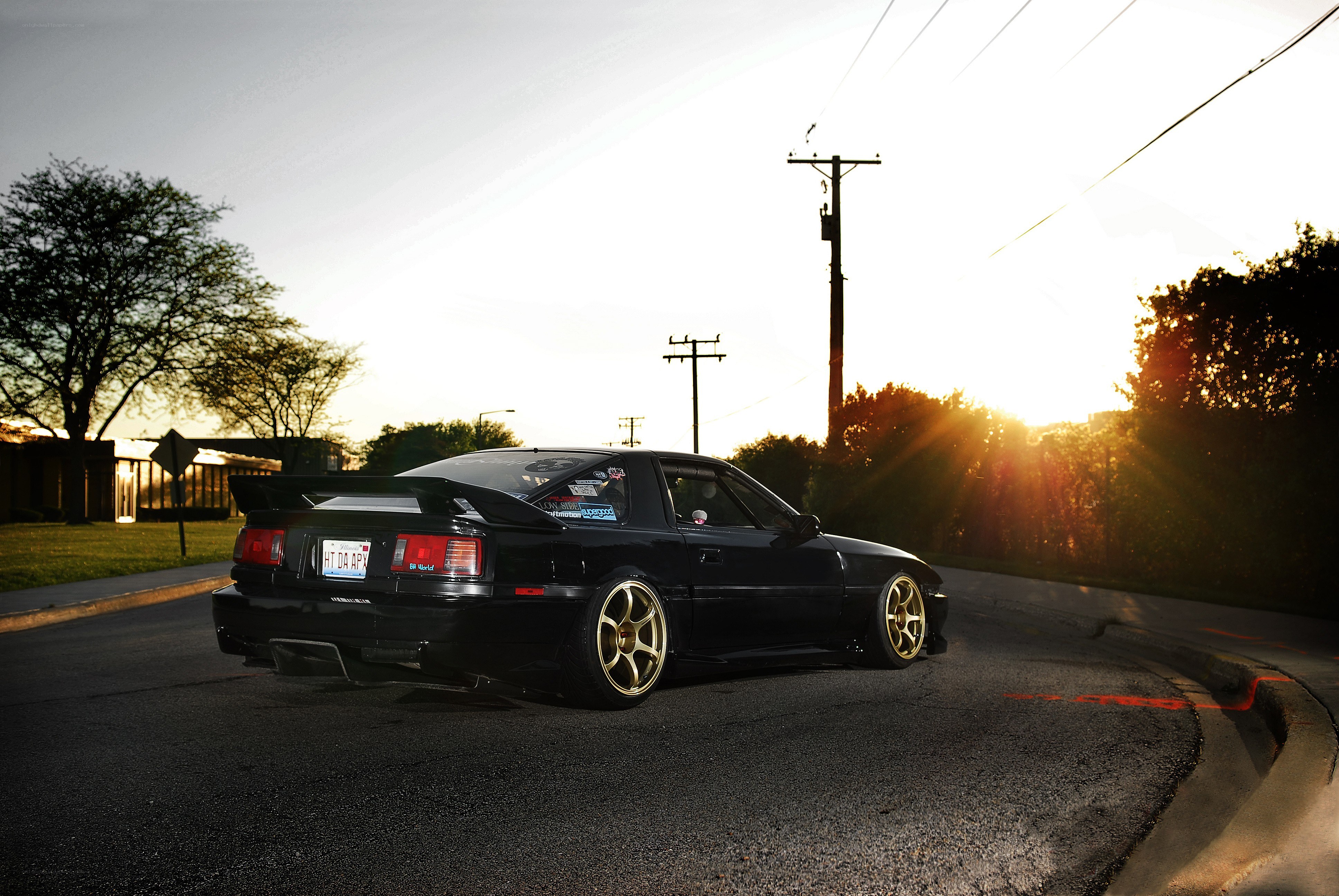 black car at sunset