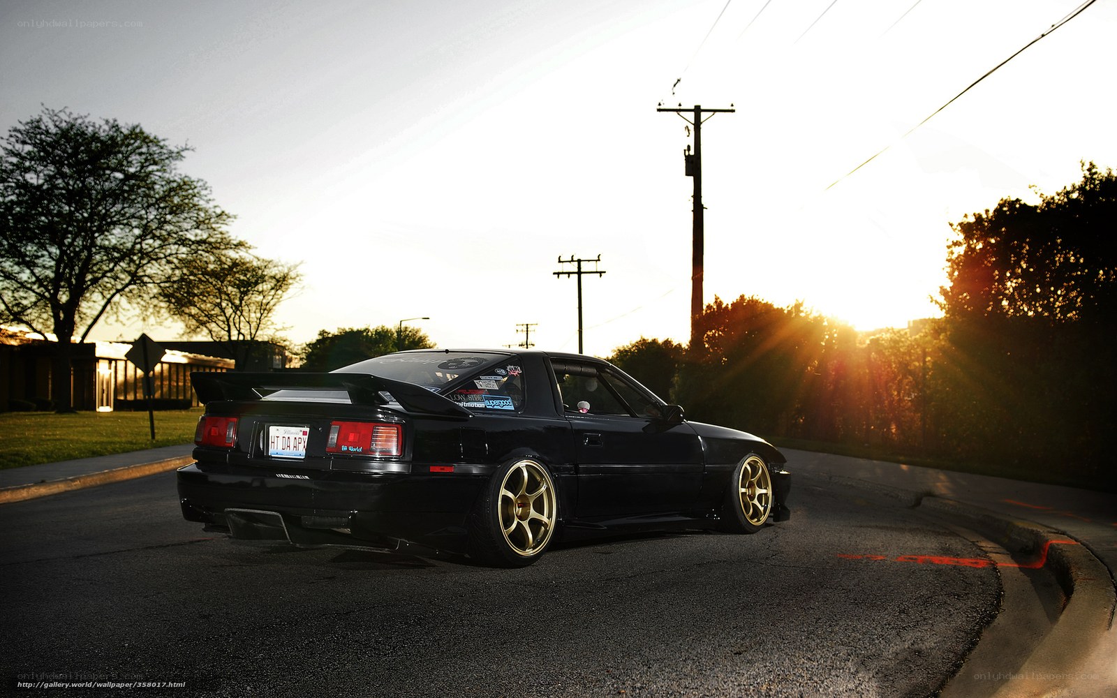 black car at sunset