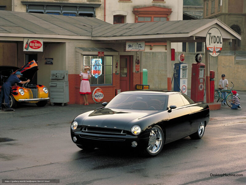 Black car at vintage gas station