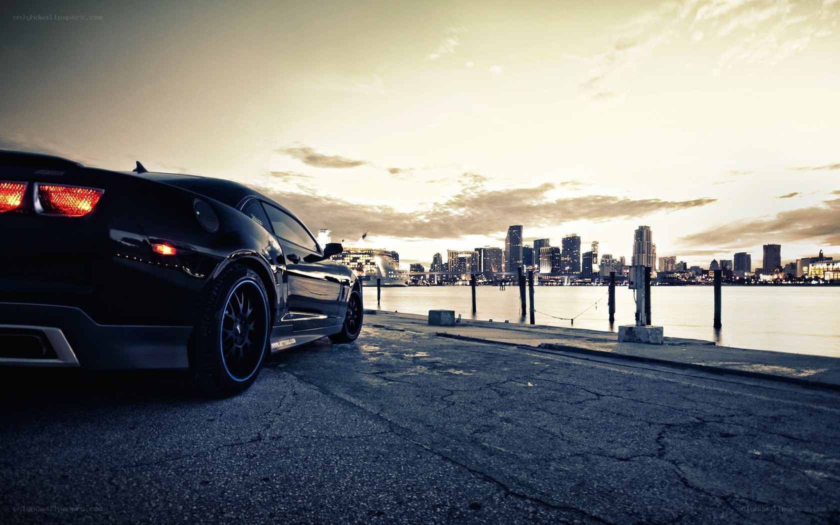 Black car at waterfront