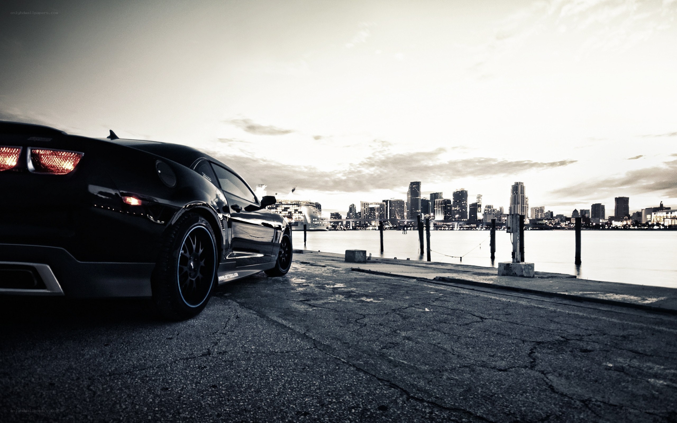 Black car by the waterfront
