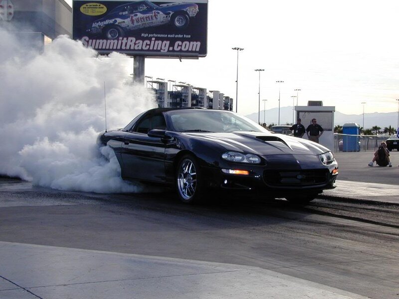 Black Car Doing Burnout — Dramatic
