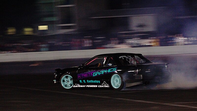 Black car drifting at night