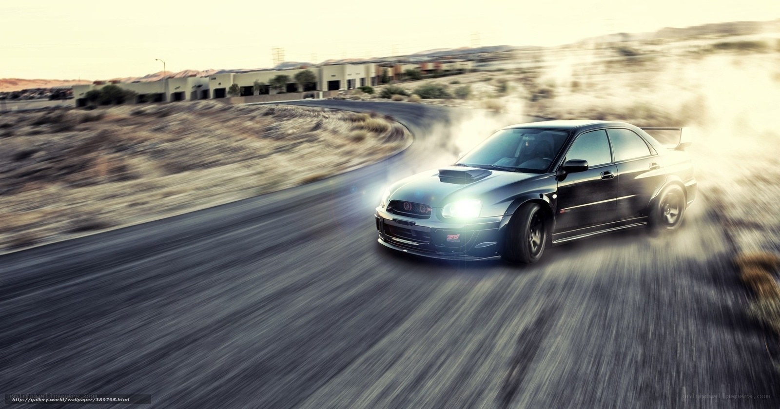 Black car drifting on road