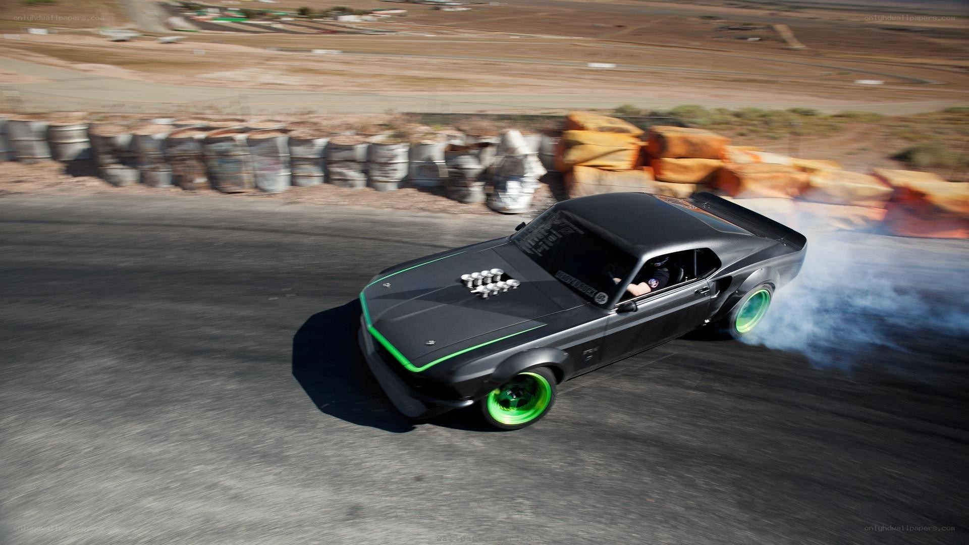 black car drifting on track