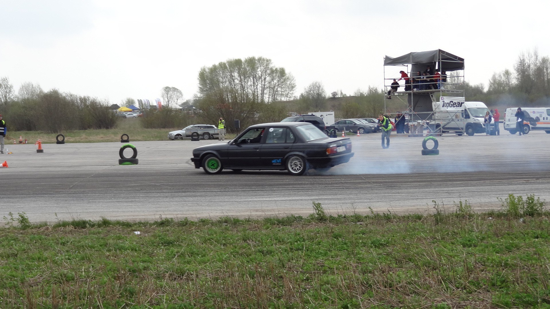 Black car drifting on track