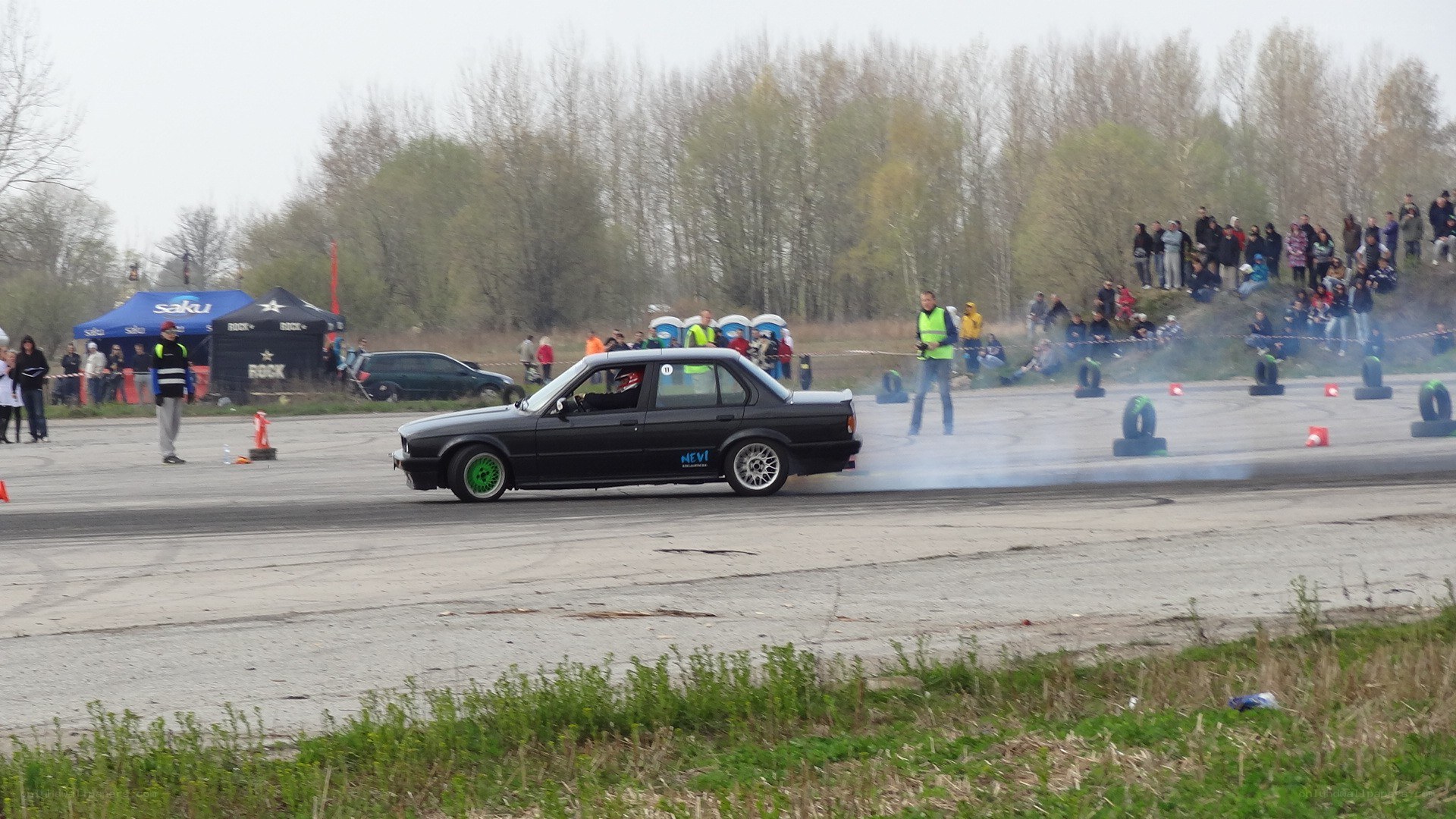 Black car drifting on track