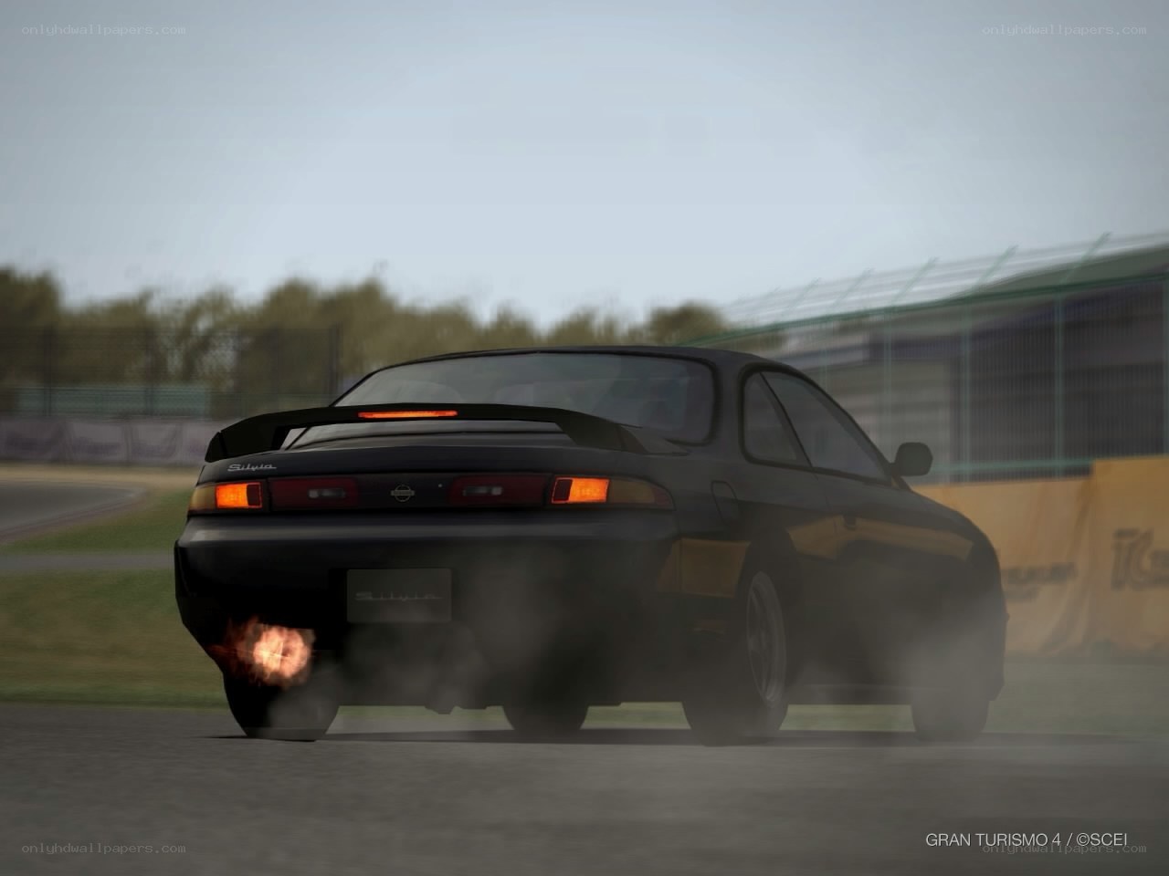 Black car drifting on track