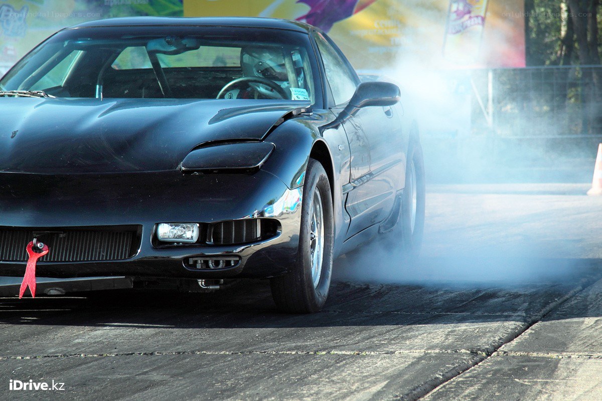 Black car drifting on track