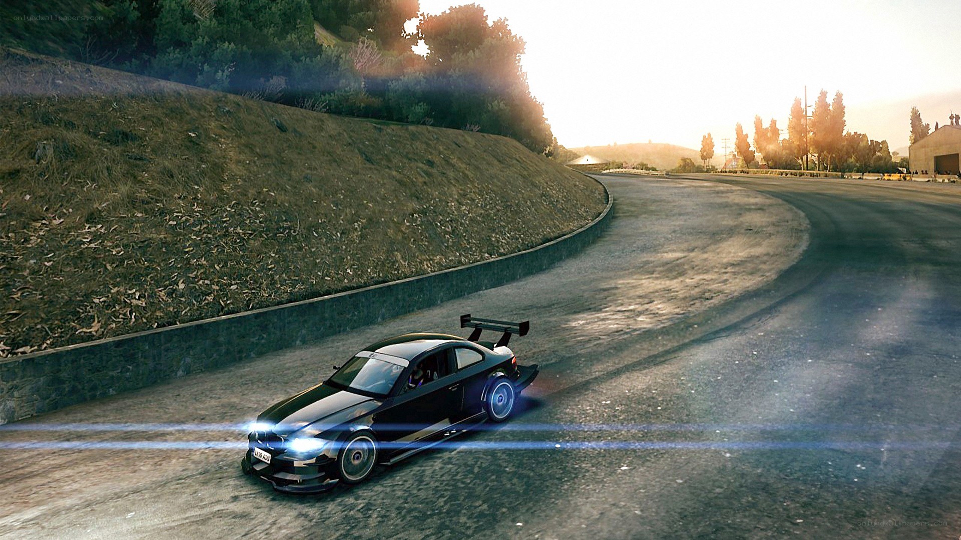 black car drifting on track