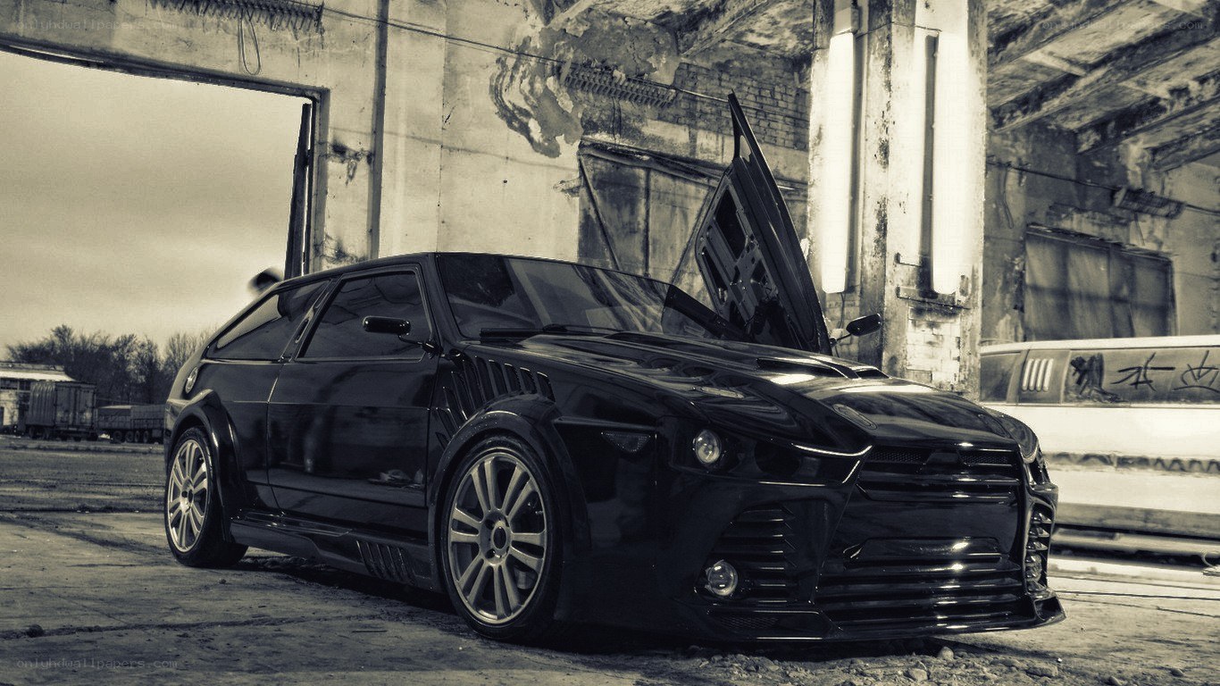 Black car in abandoned building