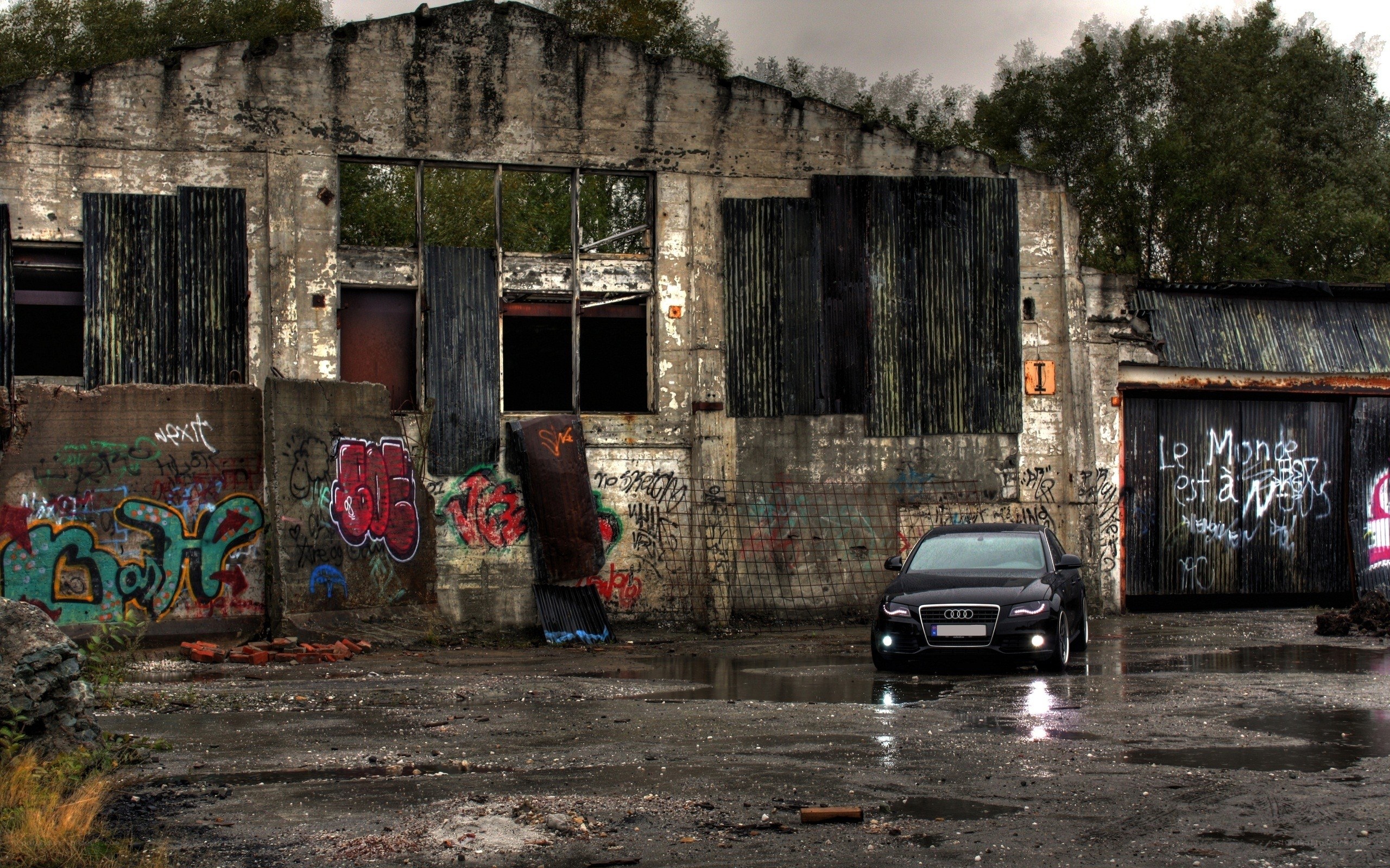 Black car in abandoned building