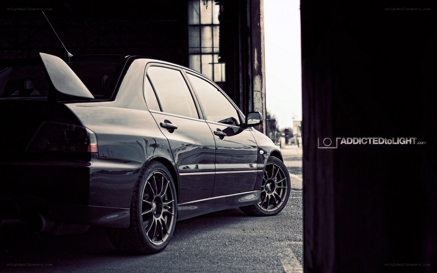 black car in garage