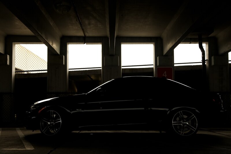 Black Car in Garage — Dramatic, Photograph